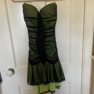 Strapless. Black and green fun dress with ruffles